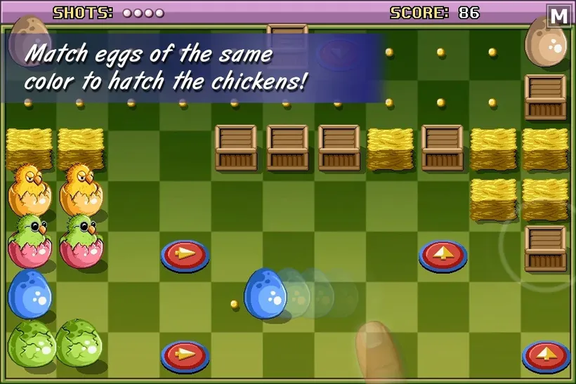 Nível do Chicken & Egg com ovos coloridos, fardos de palha e pintainhos a sair da casca